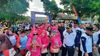 Gubernur Arinal Lepas Jalan Sehat Peringati Hari Ibu di Tulang Bawang - Yopie Pangkey Gubernur Arinal Lepas Jalan Sehat Peringati Hari Ibu di Tulang Bawang - Yopie Pangkey.webp