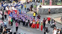 Kirab Marching Band dan Mobil Hias Meriahkan Peringatan HUT Ke-60 Provinsi Lampung Kirab Marching Band dan Mobil Hias Meriahkan Peringatan HUT Ke-60 Provinsi Lampung.webp