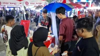 Kopi Keliling di Lampung Fest Laris Ratusan Cangkir Warnai Dinamika Ekonomi Rakyat - Yopie Pangkey 2