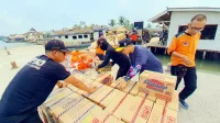 Pemprov Lampung Salurkan Bantuan Logistik dan Peralatan Pemadaman Karhutla TN Way Kambas - Yopie Pangkey